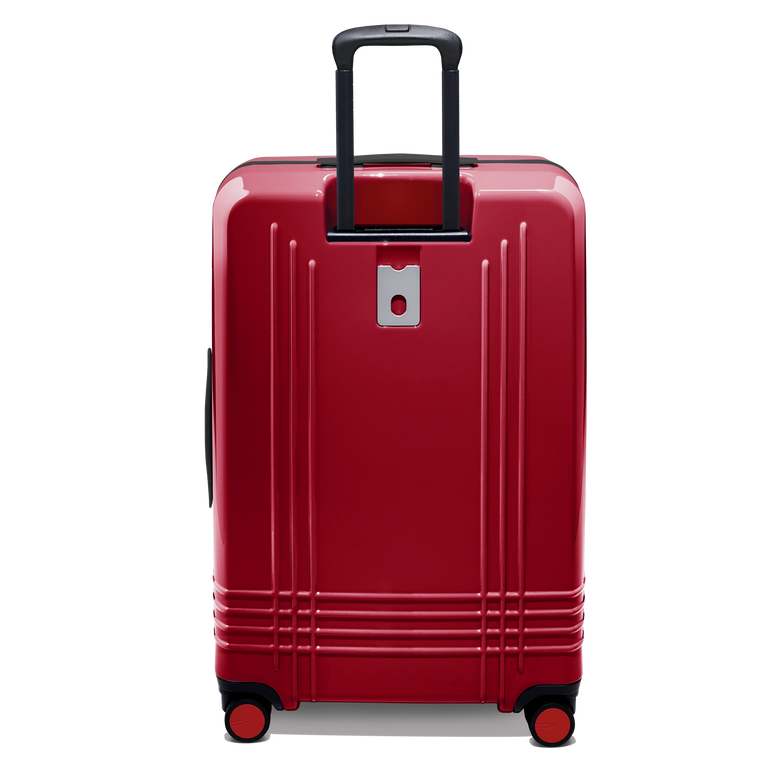 Every bag comes with the option for a free monogram on the ID plate which contains a slot for your contact information.