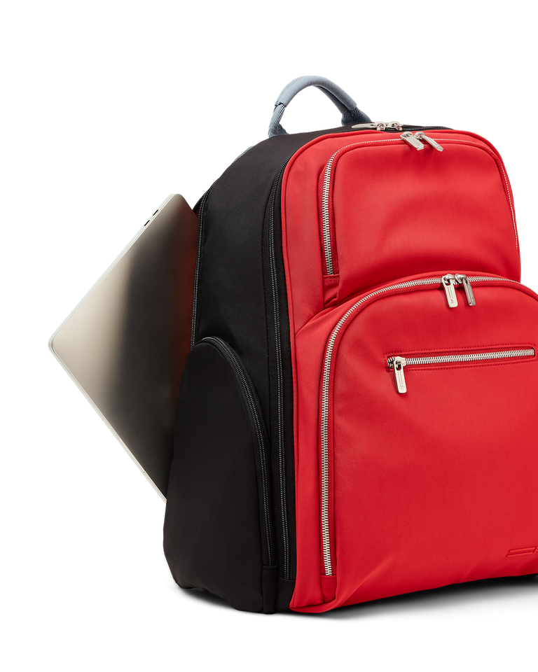 red backpack with laptop