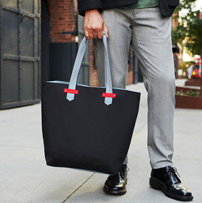 Man holding tote